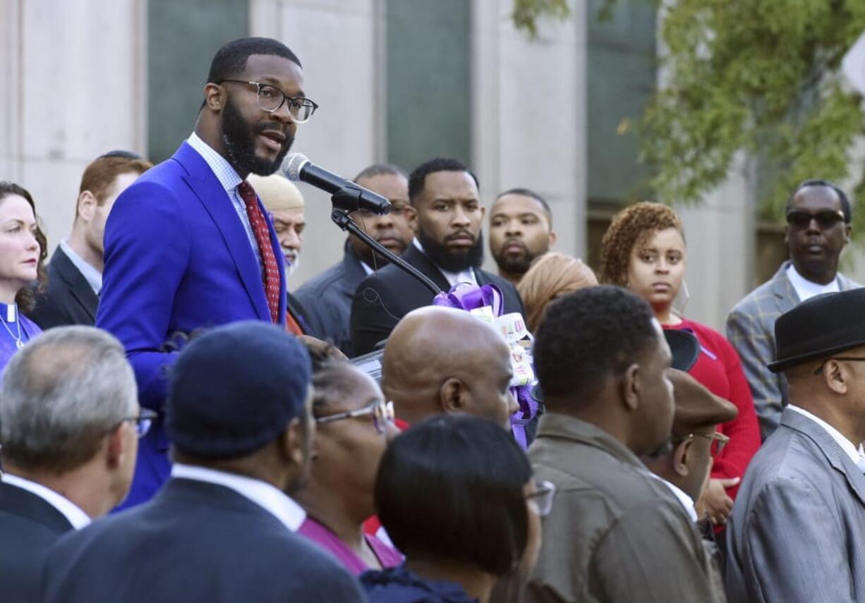 FILE - In this Wednesday, Oct. 23, 2019, file photo, Birmingham Mayor Randall Woodfin speaks at a candlelight vigil in Birmingham, Ala. Woodfin is endorsing Joe Biden for the 2020 Democratic Party nomination just weeks after the vice president met with a group of Southern black mayors representing millions of voters in key early primary states.