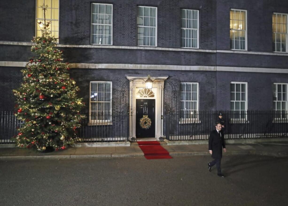 French President Emmanuel Macron leaves 10 Downing Street after meeting with Britain&#039;s Prime Minister Boris Johnson and other heads of State, ahead of the NATO summit, in London, Tuesday, Dec. 3, 2019.  U.S. President Donald Trump and his NATO counterparts were gathering in London Tuesday to mark the alliance&#039;s 70th birthday amid deep tensions as spats between leaders expose a lack of unity that risks undermining military organization&#039;s credibility.