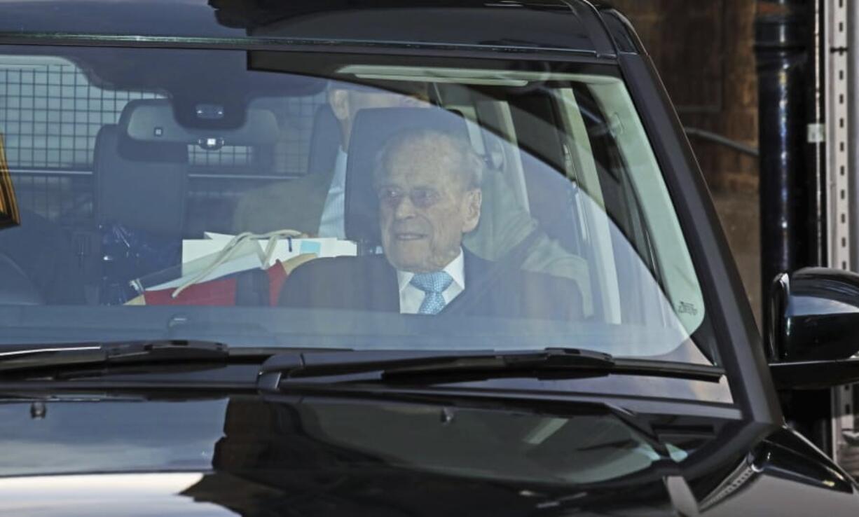 Britain&#039;s Prince Philip leaves King Edward VII Hospital in London, Tuesday Dec. 24, 2019. Prince Philip left hospital Tuesday after being treated for what Buckingham Palace called a &quot;pre-existing condition.&quot;The 98-year-old is expected to join the rest of Britain&#039;s royal family for Christmas at Sandringham House in eastern England.