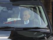 Britain&#039;s Prince Philip leaves King Edward VII Hospital in London, Tuesday Dec. 24, 2019. Prince Philip left hospital Tuesday after being treated for what Buckingham Palace called a &quot;pre-existing condition.&quot;The 98-year-old is expected to join the rest of Britain&#039;s royal family for Christmas at Sandringham House in eastern England.