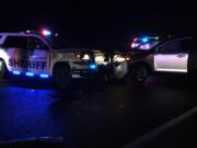 A Clark County Sheriff's Office deputy was injured early Sunday when he put his patrol vehicle into the path of an oncoming wrong-way drunk driver to prevent the driver from entering Interstate 5.