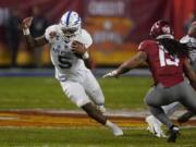 Air Force quarterback Donald Hammond III (5) runs for a first down against Washington State during the first half during the Cheez-It Bowl NCAA college football game, Friday, Dec. 27, 2019, in Phoenix.