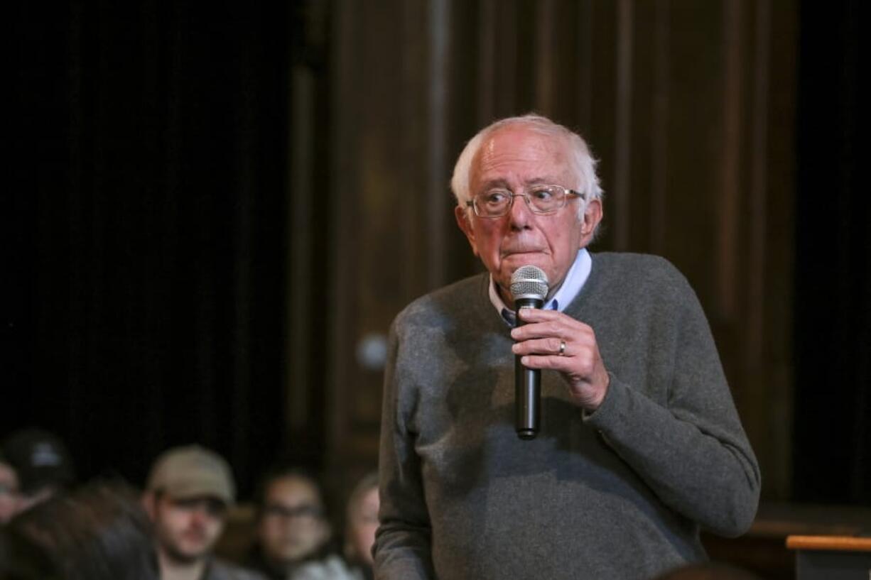 Democratic presidential candidate Sen. Bernie Sanders, I-Vt., listens as an audience member poses a question at a Newport Town Hall Breakfast Sunday, Dec. 29, 2019, at the Newport Opera House in Newport, N.H.