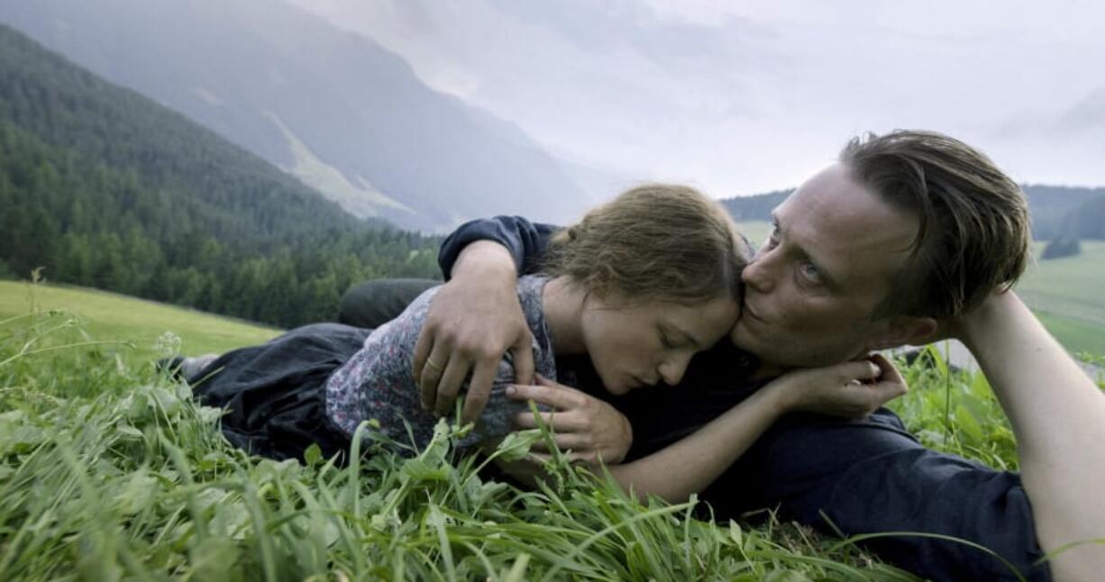 This image released by Fox Searchlight Pictures shows Valerie Pachner, left, and August Diehl in a scene from the film &quot;A Hidden Life.&quot; (Reiner Bajo/Fox Searchlight Pictures via AP) (Reiner Bajo/Fox Searchlight Pictures)