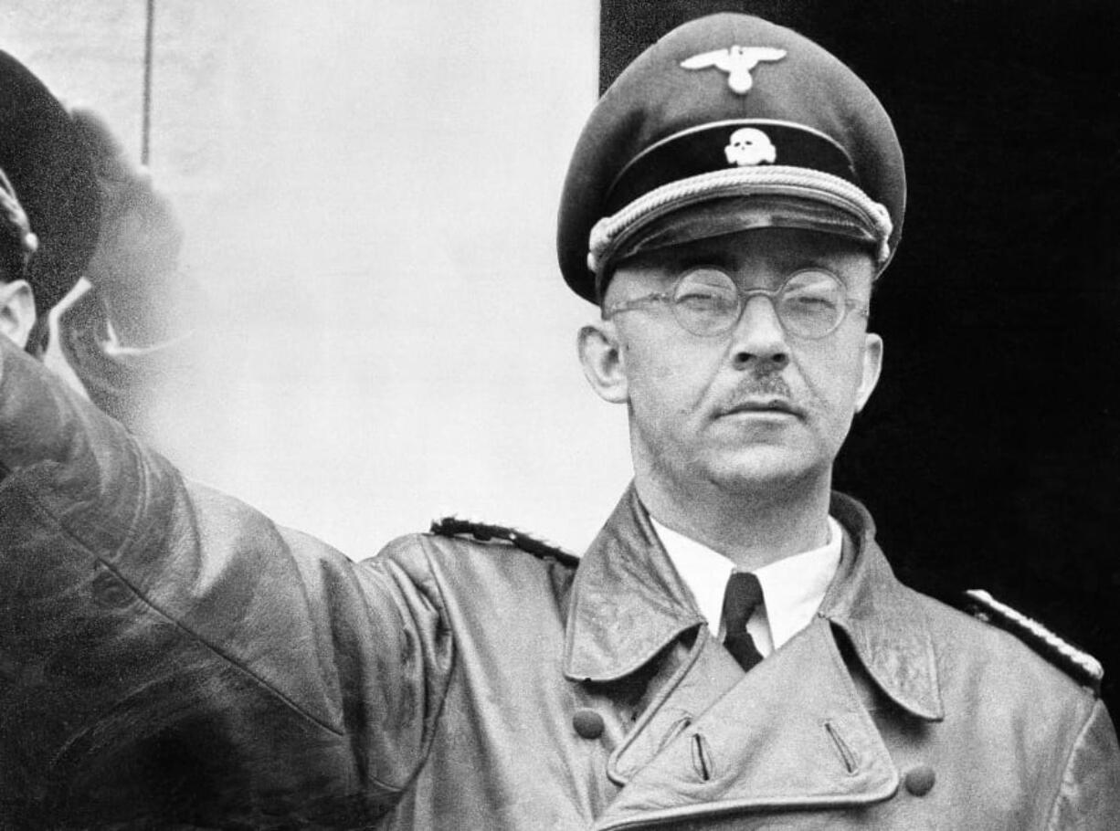 FILE - The undated file photo shows German Nazi party official and head of the SS, Heinrich Himmler. at unknown location in Germany.