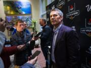 Washington head coach Chris Petersen speaks with reporters ahead of the Las Vegas Bowl NCAA college football game in Las Vegas, Tuesday, Dec. 17, 2019.