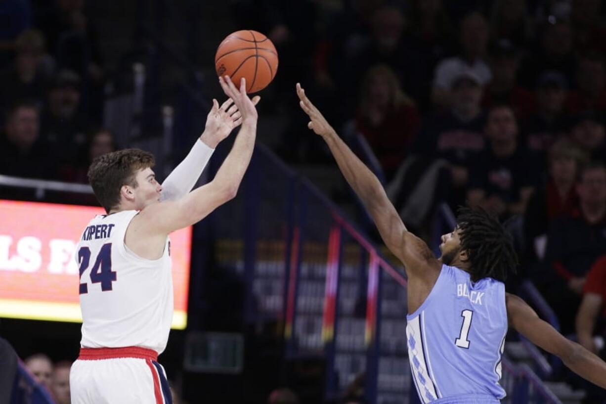 Gonzaga forward Corey Kispert (24) shoots over North Carolina guard Leaky Black (1) during the first half of an NCAA college basketball game in Spokane, Wash., Wednesday, Dec. 18, 2019.