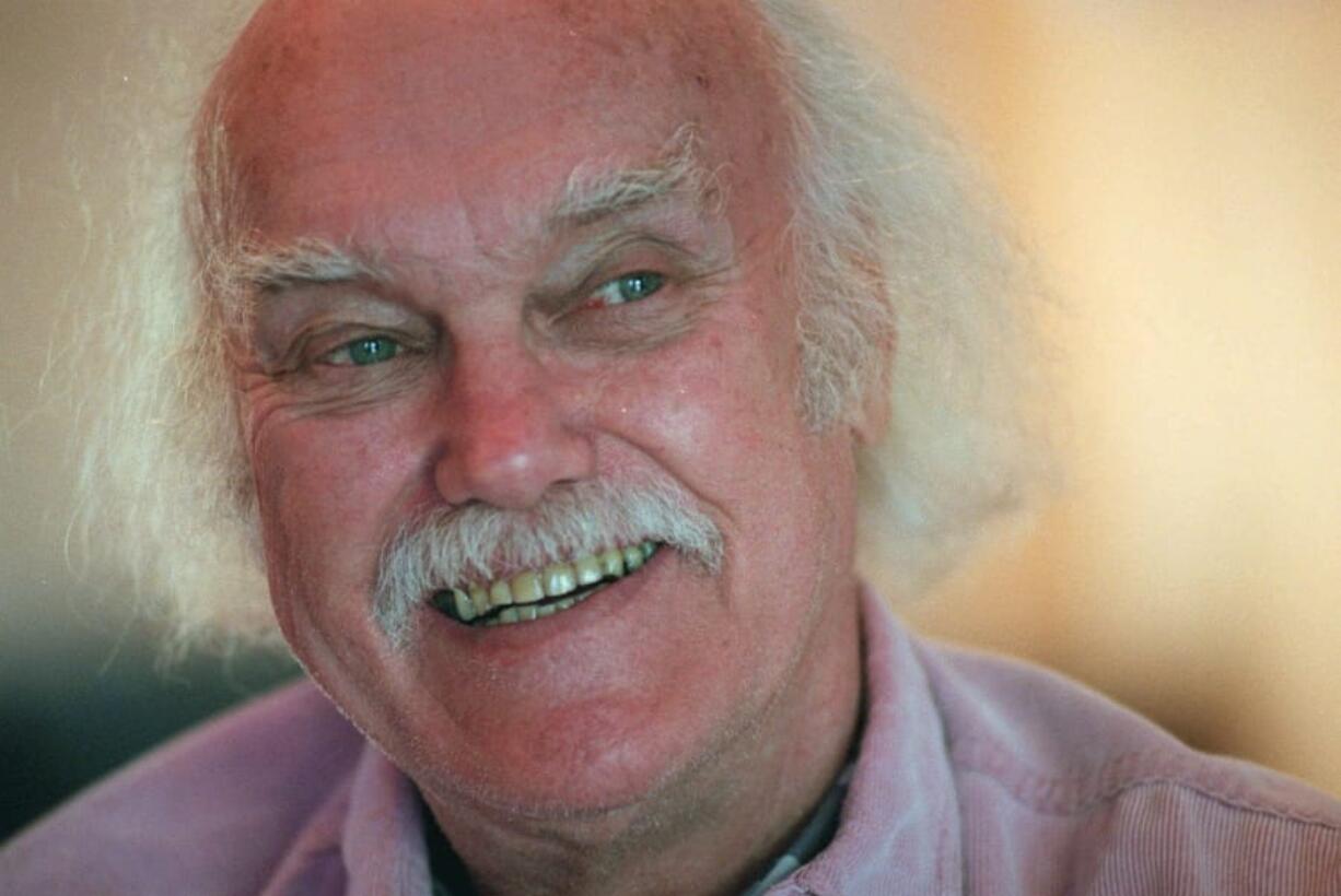 FILE - In this Oct. 21, 1998 file photo, Ram Dass, best known for the 1971 bestseller &quot;Be Here Now,&quot; smiles during an interview at his San Anselmo, Calif., home. The 1960s counterculture spiritual leader and early LSD proponent died, Sunday, Dec. 22, 2019 at his home in Maui, Hawaii. He was 88.