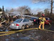 A fire in Ridgefield on Monday morning destroyed an RV trailer and damaged a boat, motorhome and cars, according to Clark County Fire & Rescue. A total of 12 responders helped extinguish the blaze.