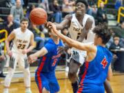 Images from Ridgefield’s 69-27 win over Hudson’s Bay in nonleague boys basketball action on Tuesday at Hudson’s Bay High School.