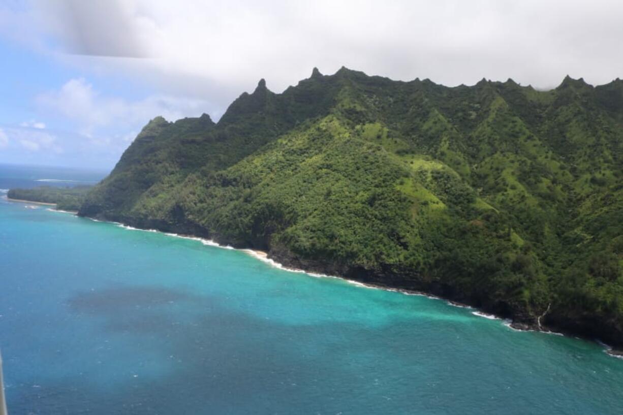 This photo provided by the Hawaii department of Land and Natural Resources shows an area over Napali Coast State Wilderness Park where search and rescue are searching for a tour Helicopter that disappeared in Hawaii with several people aboard on Friday, Dec. 27, 2019. Authorities say the helicopter&#039;s owner called for help about 45 minutes after the chopper was due back from a tour of Kauai&#039;s Na Pali Coast on Thursday evening.