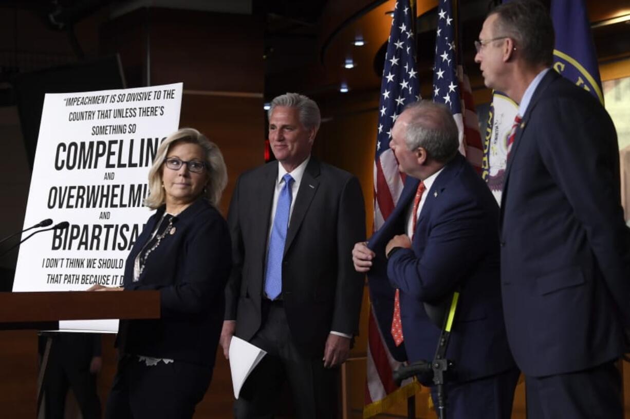 House Minority Leader Kevin McCarthy of Calif., second from left, is joined by Rep. Liz Cheney, R-Wy., left, House Minority Whip Steve Scalise, R-La., second from right, and House Judiciary Committee ranking member Rep. Doug Collins, R-Ga., right, at the start of a news conference on Capitol Hill in Washington, Tuesday, Dec. 3, 2019.