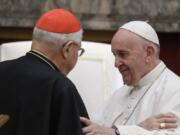 Pope Francis exchanges greetings with Cardinal Angelo Sodano, left, on the occasion of the pontiff&#039;s Christmas greetings to the Roman Curia, in the Clementine Hall at the Vatican, Saturday, Dec. 21, 2019.