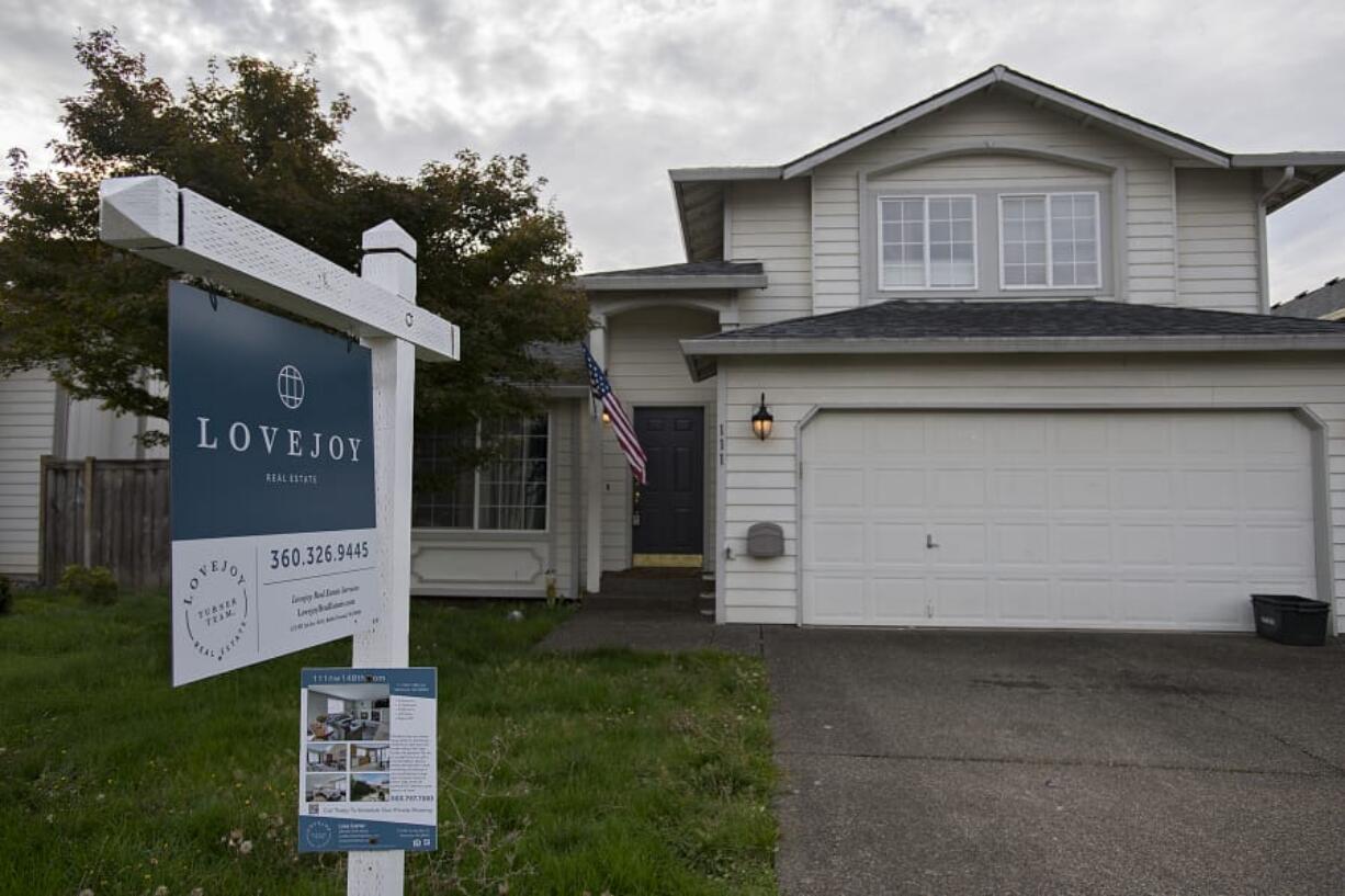 A sign notifies those passing by of a home for sale in Salmon Creek in October.