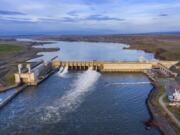 This aerial view shows the Ice Harbor Dam in April, looking east up the Snake River.