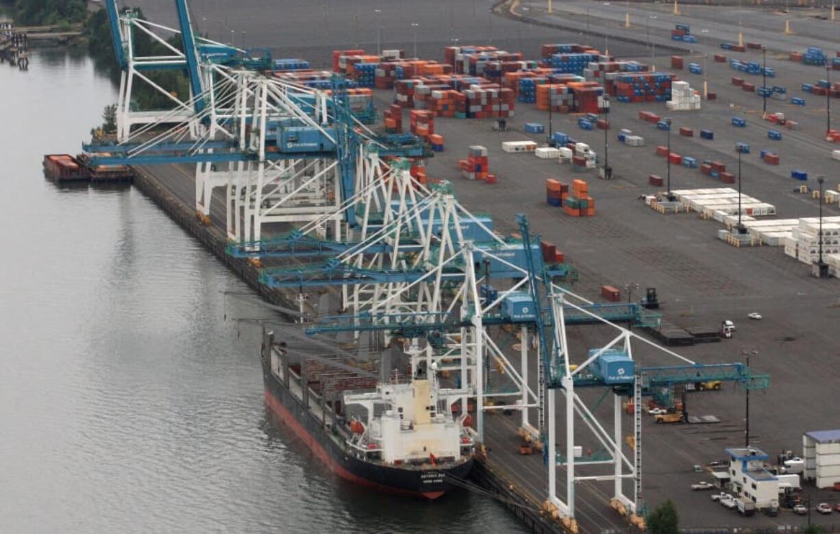 FILE - In this June 29, 2012, file photo, containers sitting at the Port of Portland&#039;s Terminal 6, in Portland, Ore. Questions about the legality of a Port of Portland subsidy for ocean carriers have been kicked to the Oregon Supreme Court by the 9th U.S. Circuit Court of Appeals, who has ruled that the financial system used to manage the subsidy program isn&#039;t clearly legal under current Oregon case law.