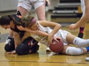 Skylar Bea, left, and her Washougal teammates always seem to get a hand on the ball. The Panthers&#039; disruptive defense has been a key to the team&#039;s success this season.