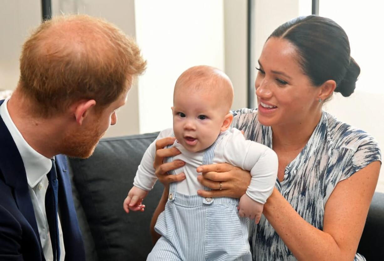 The Duke and Duchess of Sussex holding their son Archie during a meeting Sept. 25 with Archbishop Desmond Tutu and Mrs. Tutu at their legacy foundation in Cape Town, on day three of their tour of Africa.