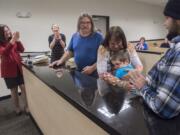 Shelly Krebs, the Bauer&#039;s attorney, from left, Kaine&#039;s Case Worker Jennifer Brinkman, Roddy Bauer, Crystal Bauer, Kaine Jackson Bauer, and Ronald Bauer, the Bauer&#039;s biological son, celebrate in the courtroom following Kaine&#039;s official adoption on Nov. 16, 2018. Crystal said Kaine insisted his name be changed to Michael Jackson following the adoption, but the Bauers convinced him to only change his middle name.