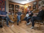 Fadin&#039; by 9&#039;s Seth Moran, from left, Dave Irwin, Joe Lapidus and Ben Shafton remember the joys and challenges of recording a new album at Irwin&#039;s home on a recent Thursday night.