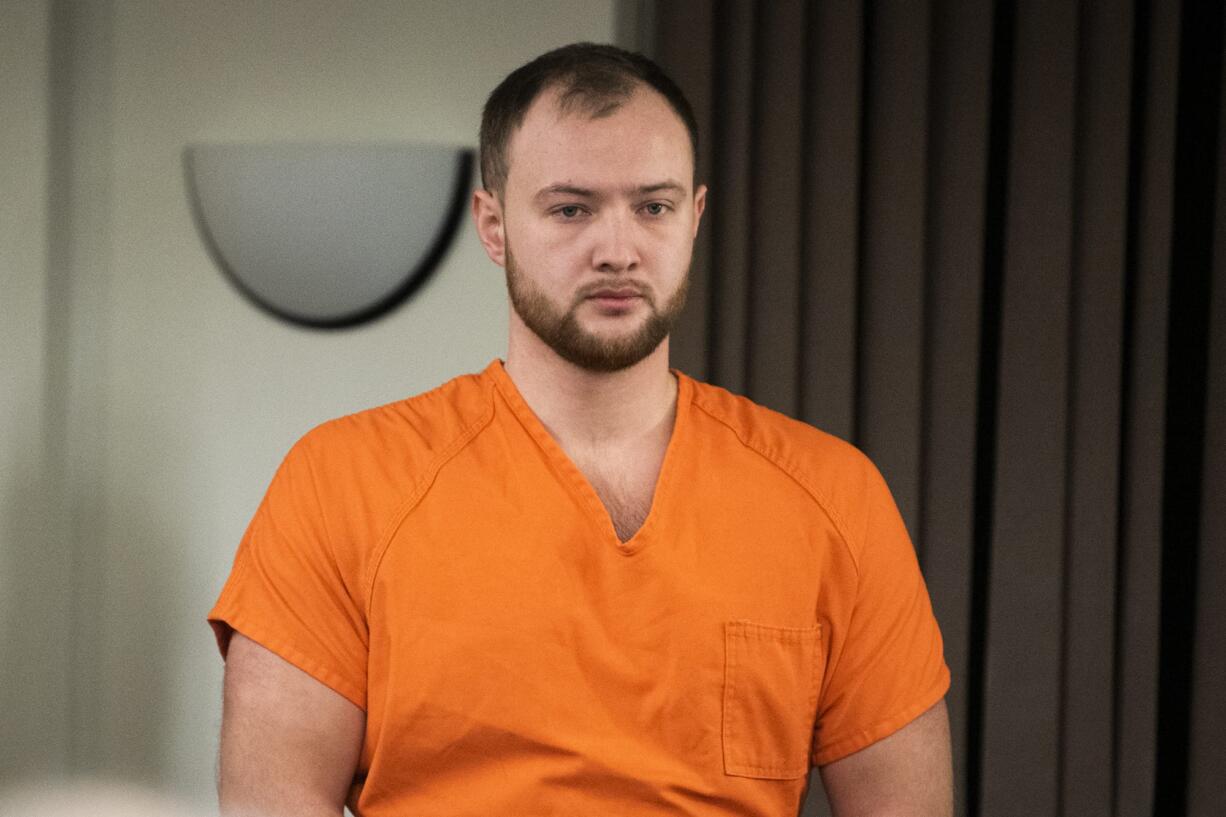 David Y. Bogdanov, center, appears for a bail review hearing in connection with the death of Nikki Kuhnhausen in Clark County Superior Court on Thursday morning, Jan. 2, 2020. Judge David Gregerson set $750,000 bail Thursday for the suspect in the slaying of a transgender Vancouver teen.