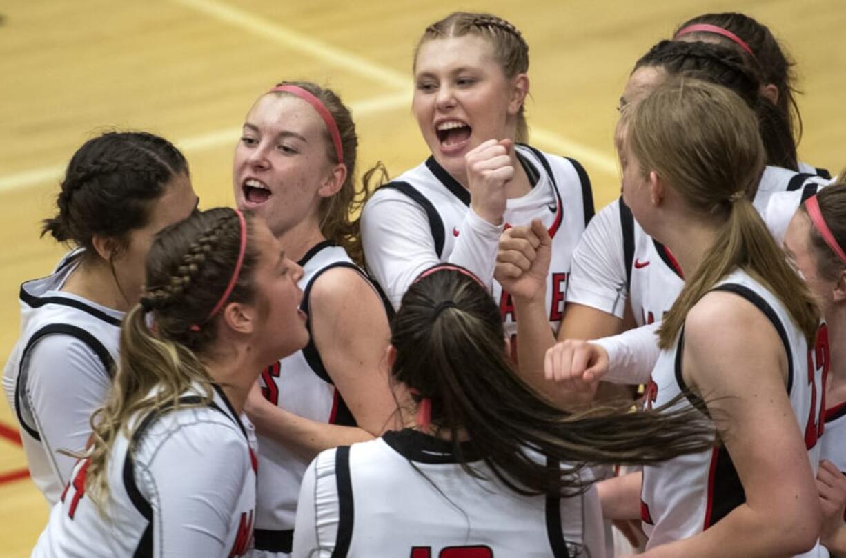 Camas circles up before Tuesday night&#039;s game against Union at Camas High School in Camas on Jan. 7, 2020. Camas won 52-44.