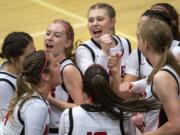 Camas circles up before Tuesday night&#039;s game against Union at Camas High School in Camas on Jan. 7, 2020. Camas won 52-44.