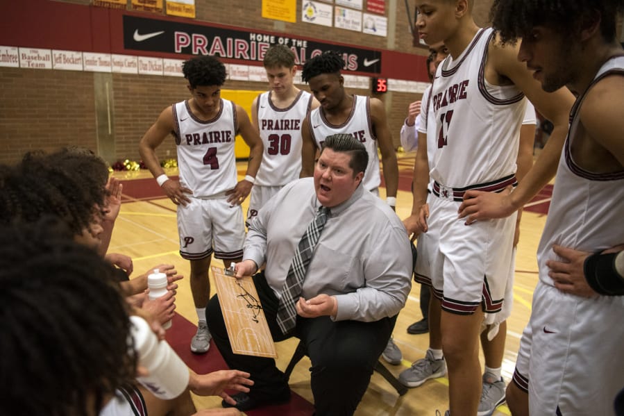 Prairie coach Jimmy Tuominen talks with his team during Friday night&#039;s game at Prairie High School in Vancouver on Jan. 10, 2020. Prairie won 44-32.