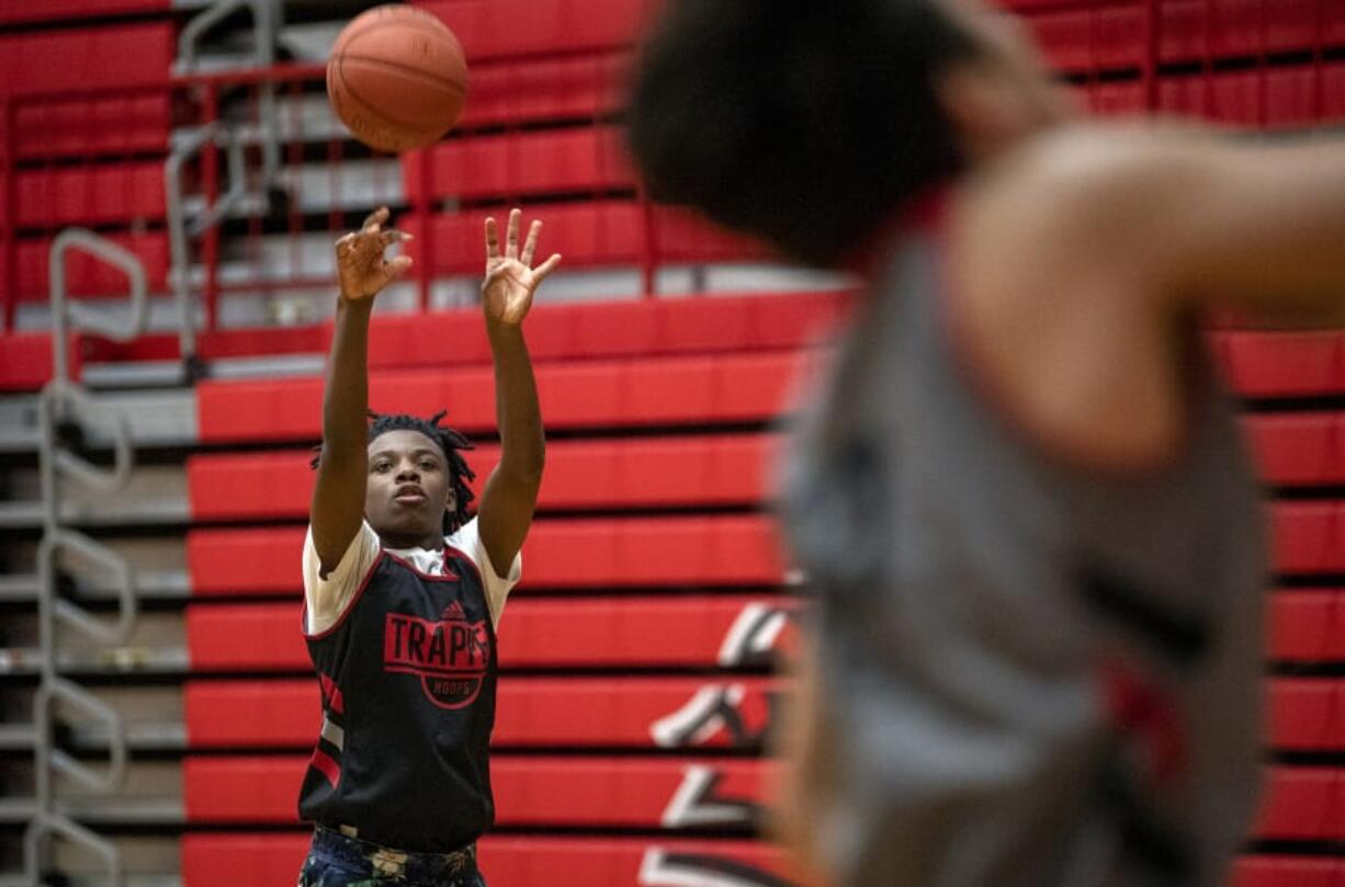 Fort Vancouver's Kahlil Singleton works on his shot during practice Monday. Singleton, a sophomore broke the long-standing school record by scoring 55 points in a recent game. The previous record was shared by two players from 1955 and 1911.