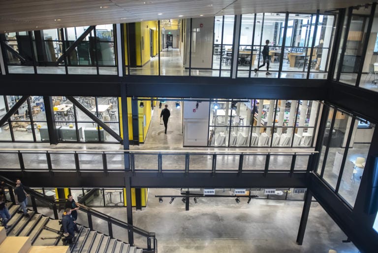 Students walk through the common area of the new 	iTech Preparatory School on Friday morning, Jan. 10, 2020.