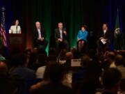 Jennifer Baker, president of the Columbia River Economic Development Council and panel moderator, from left, Curtis Robinhold, executive director of the Port of Portland, Cornell Clayton, director of the Thomas S. Foley Institute for Public Policy and Public Service at Washington State University, Lisa Brown, director of the Washington State Department of Commerce, and Frank Foti, Vigor Industrial&#039;s Board Vice Chairman and founding CEO, speak about the state and national economies during the 2020 Economic Forecast Breakfast on Thursday morning.