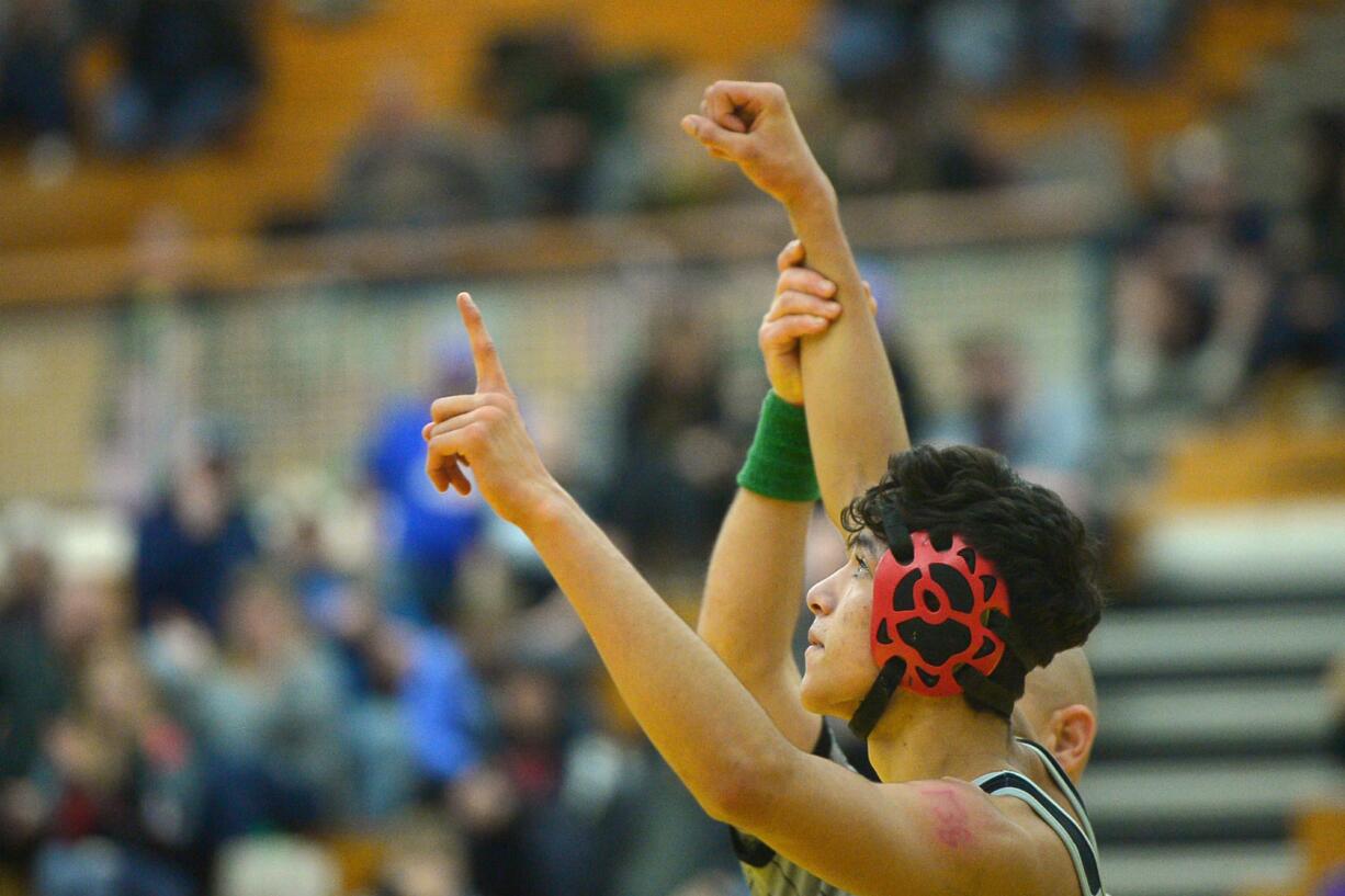 Union's Andres Nicacio beats Prairie's Bridger Paradis to win the 138-pound weight class at the Clark County Championship wrestling tournament at Skyview High School on Saturday, January 18, 2020.