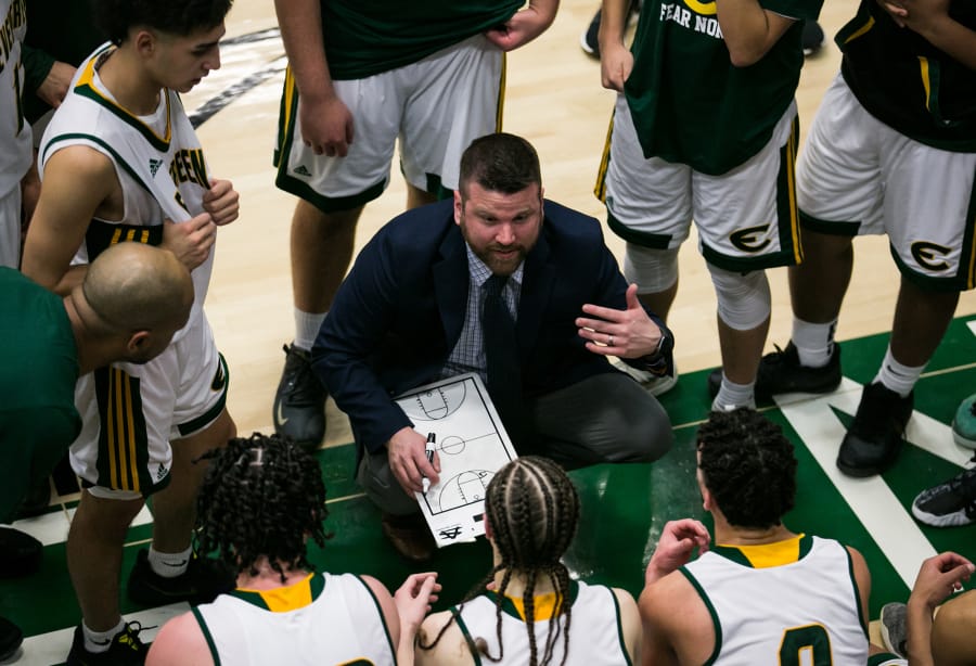 Evergreen boys basketball head coach Brett Henry talks to his players in the final minutes of a game against Prairie at Evergreen High School, Friday, January 24, 2020. Evergreen went on to defeat Prairie 63-57.