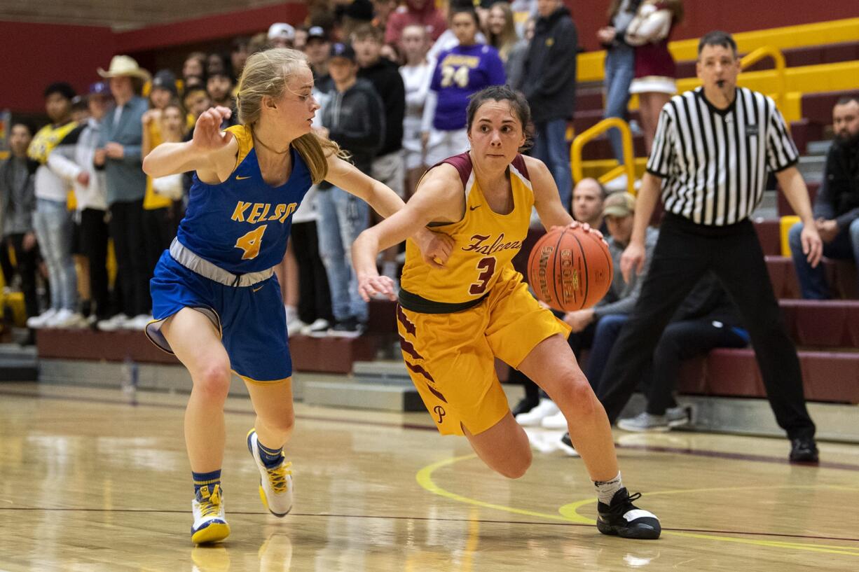 Kelso's Alexis Kleven (4) defends Prairie's Meri Dunford (3) during Tuesday night's game at Prairie High School in Vancouver on Jan. 28, 2020.