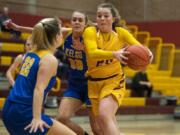 Prairie&#039;s Claire Heitschmidt (20) drives to the basket during Tuesday night&#039;s game against Kelso at Prairie High School in Vancouver on Jan. 28, 2020.