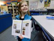 RIDGEFIELD: South Ridge Elementary School first-grader Teegan Thompson proudly shares her Flat Stanley pages.