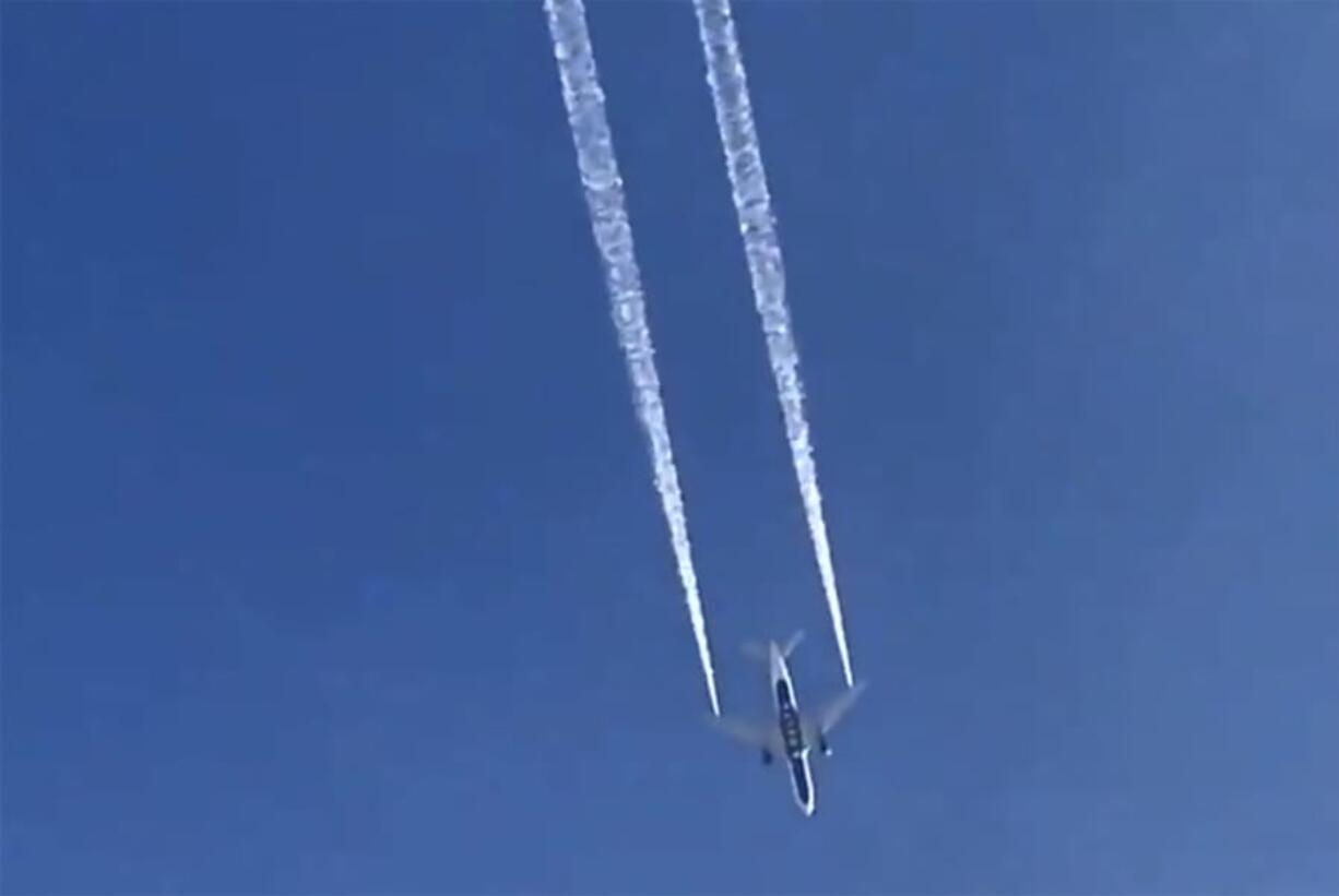 In this image from video, Delta Air Lines Flight 89 to Shanghai, China dumps fuel over Los Angeles before returning to Los Angeles International Airport for an emergency landing Tuesday, Jan. 14, 2020. Fire officials say fuel apparently dumped by the aircraft returning to LAX fell onto an elementary school playground. A fire department tweet says firefighters are assessing &quot;multiple patients&quot; at the school in the suburban city of Cudahy, Calif. The flight tracking website FlightAware shows that Delta Air Lines Flight 89 to Shanghai, China, departed LAX, circled back over Southern California and returned to the airport.