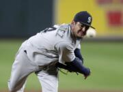 FILE - In this Sept. 20, 2019, file photo, Seattle Mariners starting pitcher Felix Hernandez throws to a Baltimore Orioles batter during the second inning of a baseball game in Baltimore. Longtime Mariners ace Hernandez reached a minor league deal with the Atlanta Braves on Monday, Jan. 20, 2020, that includes an invite to big league spring training.