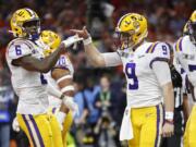 LSU quarterback Joe Burrow passes against Clemson during the second half of a NCAA College Football Playoff national championship game Monday, Jan. 13, 2020, in New Orleans.