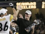 Former Pittsburgh Steelers coach Bill Cowher has been elected to the Pro Football Hall of Fame. Cowher, an analyst for CBS, was surprised by the announcement made live on air in studio before the Tennessee Titans-Baltimore Ravens AFC divisional round playoff game Saturday night, Jan. 11, 2020.