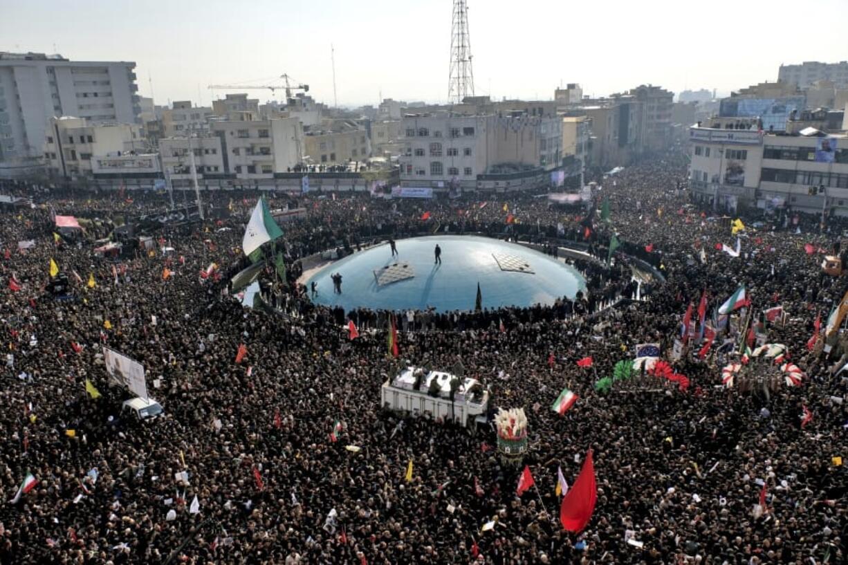 Coffins of Gen. Qassem Soleimani and others who were killed in Iraq by a U.S. drone strike, are carried on a truck surrounded by mourners during a funeral procession at the Enqelab-e-Eslami (Islamic Revolution) square in Tehran, Iran, Monday, Jan. 6, 2020. The processions mark the first time Iran honored a single man with a multi-city ceremony. Not even Ayatollah Ruhollah Khomeini, who founded the Islamic Republic, received such a processional with his death in 1989. Soleimani on Monday will lie in state at Tehran&#039;s famed Musalla mosque as the revolutionary leader did before him.