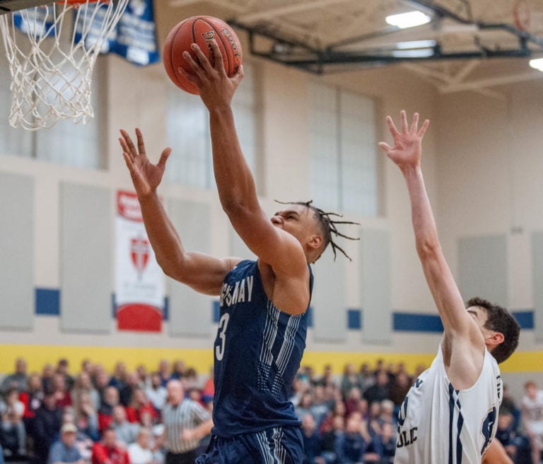 King's Way Christian's Kobi Cason makes a layup in the Knights' 75-65 win on Wednesday.