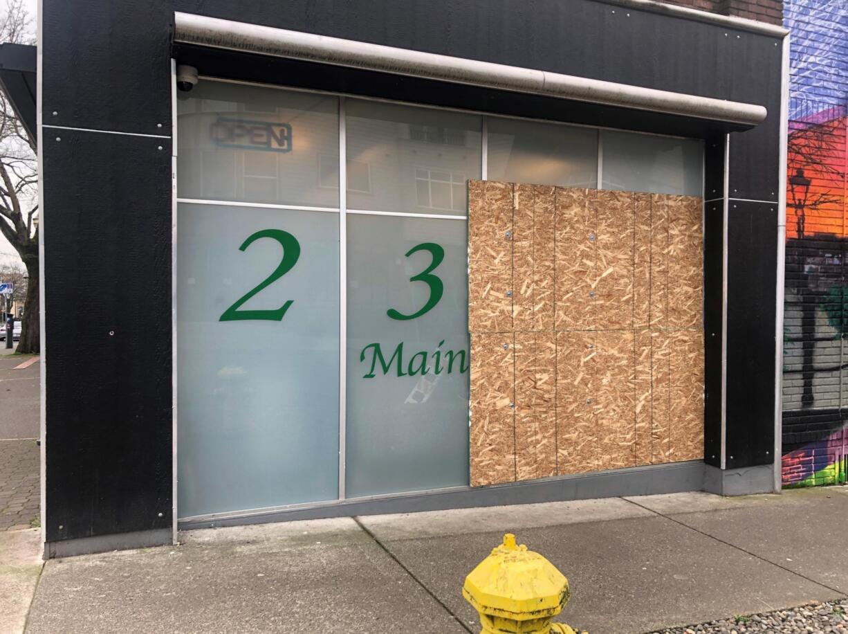 Vancouver police officers responded around 6:20 a.m. Saturday to Main Street Marijuana at 2314 Main Street for the report of a commercial burglary that just happened. Two large windows on the side of Main Street Marijuana facing West 24th Street were boarded up Monday morning.