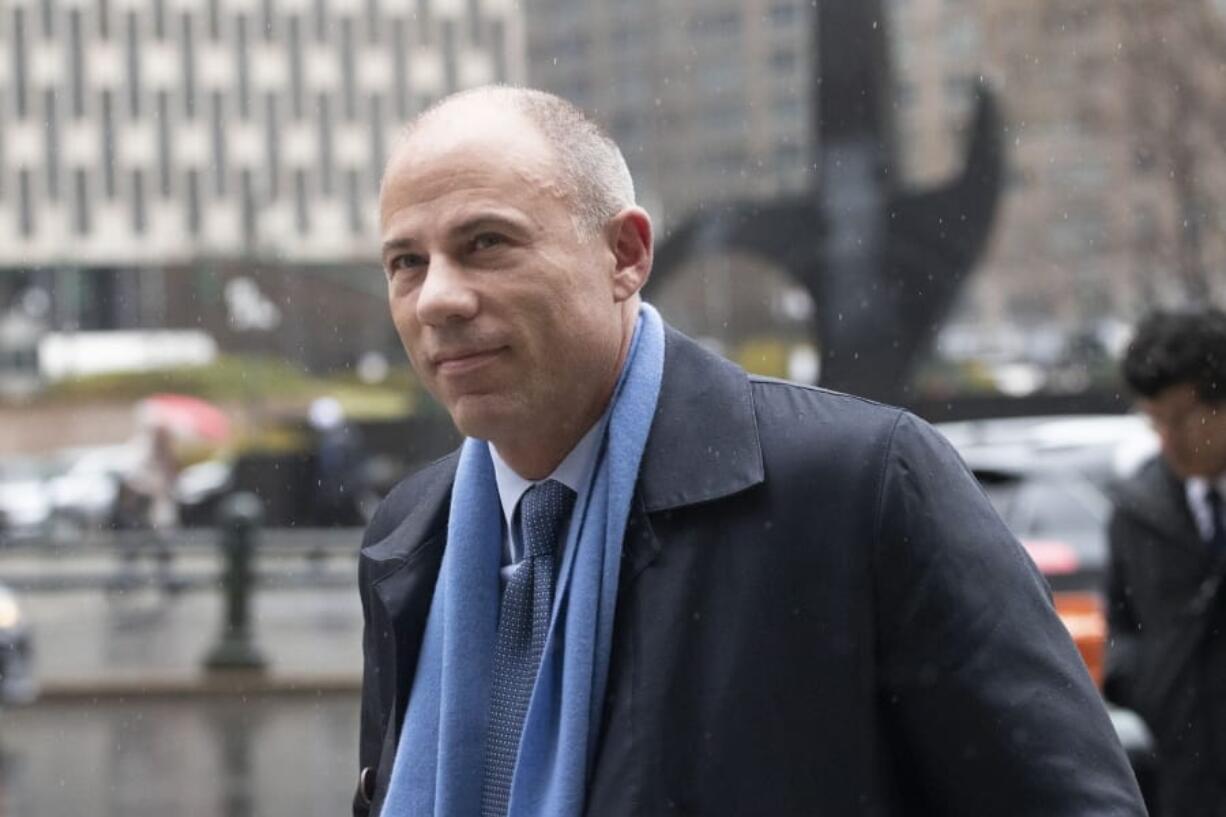 FILE - In this Dec. 17, 2019 file photo, attorney Michael Avenatti arrives at federal court to enter a plea to an indictment charging him with trying to extort up to $25 million from Nike in New York. Avenatti stood to greet 120 prospective jurors who came to a New York courtroom Monday, Jan. 27, 2020 too fill out questionnaires for his trial on charges he tried to extort millions of dollars from Nike. As they entered, jurors seemed largely unaware of Avenatti as his lawyers and others stood around him. But U.S. District Judge Paul G. Gardephe told the potential jurors that they were being considered to decide a criminal case involving charges of extortion and honest services wire fraud against Avenatti.