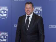 NASCAR Hall of Fame inductee Tony Stewart poses for pictures prior to the induction ceremony in Charlotte, N.C., Friday, Jan. 31, 2020.