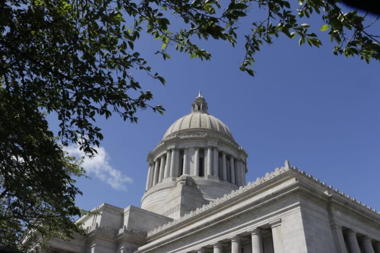 FILE - This April 27, 2019, file photo shows the Washington Capitol in Olympia, Wash. State lawmakers are facing a midnight Sunday, Jan. 26, 2020, deadline to avoid going into overtime to pass a new, two-year state budget. A House panel is considering a measure that would eliminate elections in odd-numbered years in Washington state.