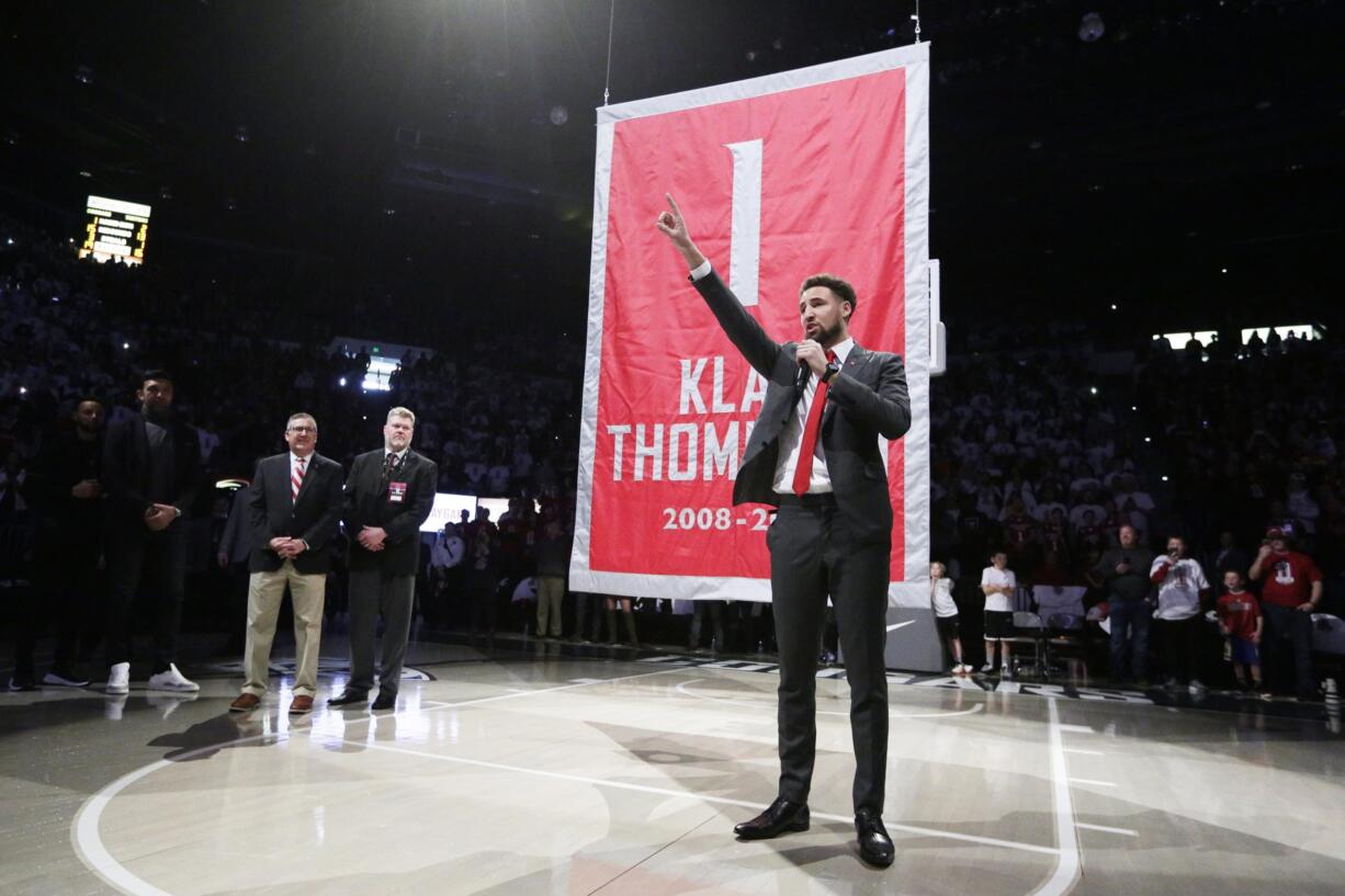 Golden State Warriors and former Washington State guard Klay Thompson speaks as the school retired his jersey number during halftime of an NCAA college basketball game between Washington State and Oregon State in Pullman, Wash., Saturday, Jan. 18, 2020.