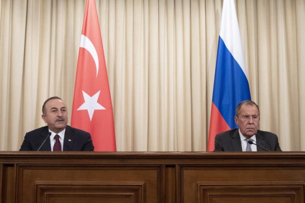 Turkish Foreign Minister Mevlut Cavusoglu, left, and Russian Foreign Minister Sergey Lavrov attend a joint news conference following their talks in Moscow, Russia, Monday, Jan. 13, 2020. Foreign and defense ministers of Russia and Turkey met as part of an effort by Moscow and Ankara to sponsor Monday&#039;s talks between rival parties in Libya in the Russian capital.