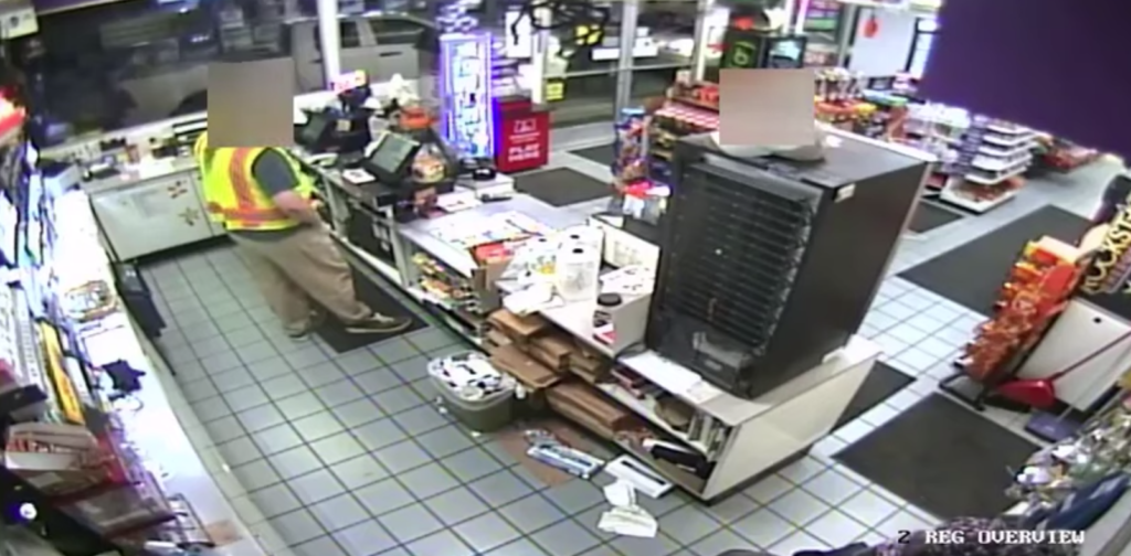 Michael Veatch can be seen in security video pointing a gun at convenience store employees in St. Helens, Ore., the night he was killed by police.