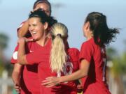 Canada&#039;s Christine Sinclair, front left, celebrates with teammates after scoring against St. Kitts and Nevis during a CONCACAF women&#039;s Olympic qualifying soccer match Wednesday, Jan. 29, 2020, in Edinburg, Texas.